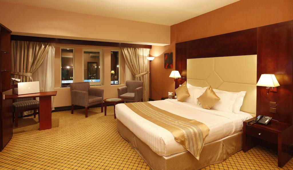 Haven Plaza Hotel Riad Cameră foto