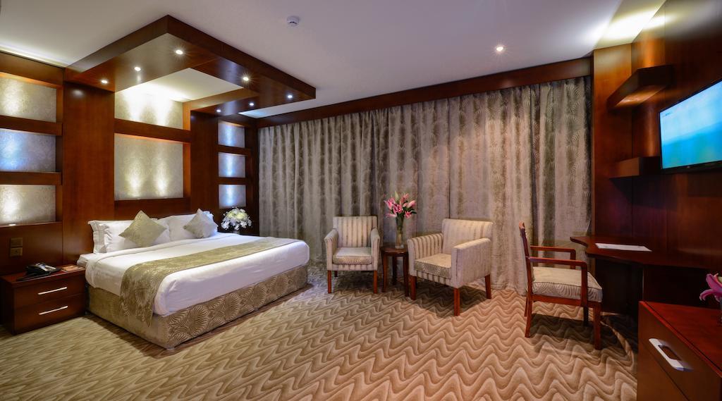 Haven Plaza Hotel Riad Cameră foto